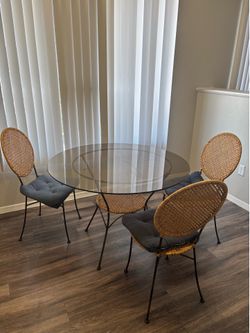 Modern glass dining table with 4 chairs — good quality