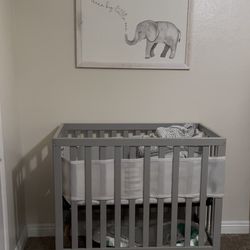 Mini crib with frame