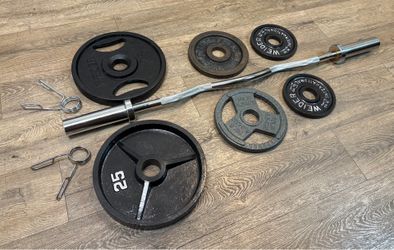 Brand NEW Olympic  Curl Bard (in cardboard tune) with cooper bearings mechanism & Cast Iron Weight Plates 25s, 10s and 5s . Total: 100 lbs