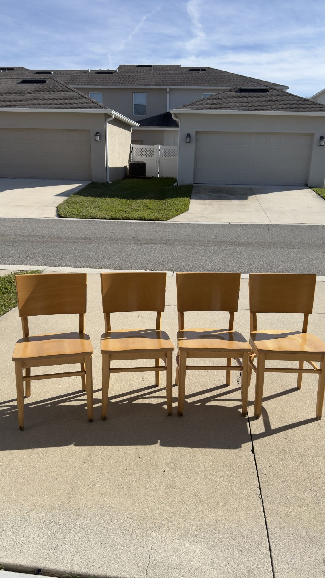 Selling 4 wooden chairs.