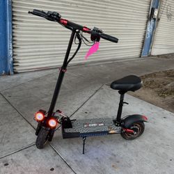 ELECTRIC SCOOTER 1000W E. SCOOTER 32MPH- RANGE 30 MILES 48V 16Ah 1000W 10" Foldable Electric Scooter 48V 16AH E Scooter for Adults with Seat 32 mph.