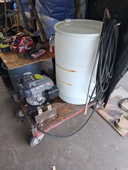 Portable with water tank pressure washer