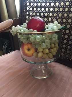 Glass bowl with imitation fruit