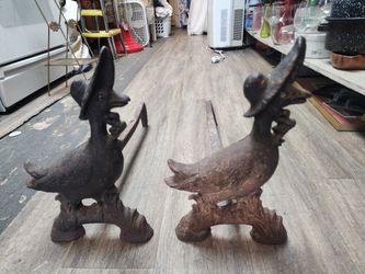antique cast iron Mother Goose Andirons.