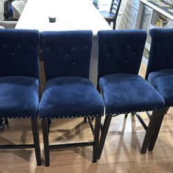 Counter height bar stools with beautiful blue velour cloth