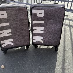 Two Pink Luggages 