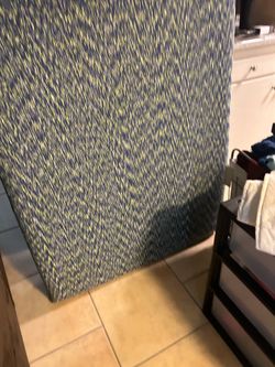 Twin mattress with blue cover