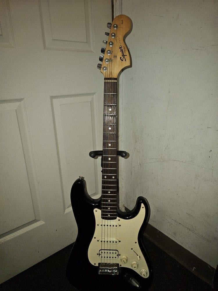 Squier Strat Fender with assortment of Tools