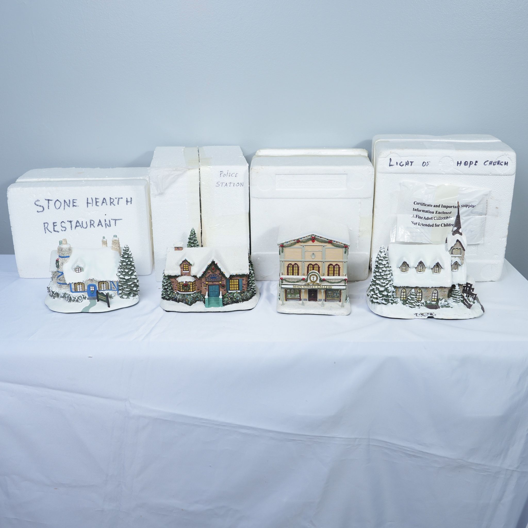Thomas Kinkade Hawthorne Christmas Village Police Station, Stonehearth Restaurant, Mainstreet Gallery, Light of Hope Church