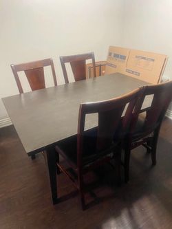 Dining room table with four chairs