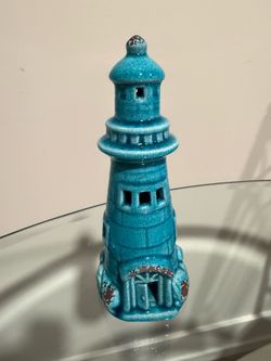 Turquoise crackled gloss light house tea light / lawn ornament
