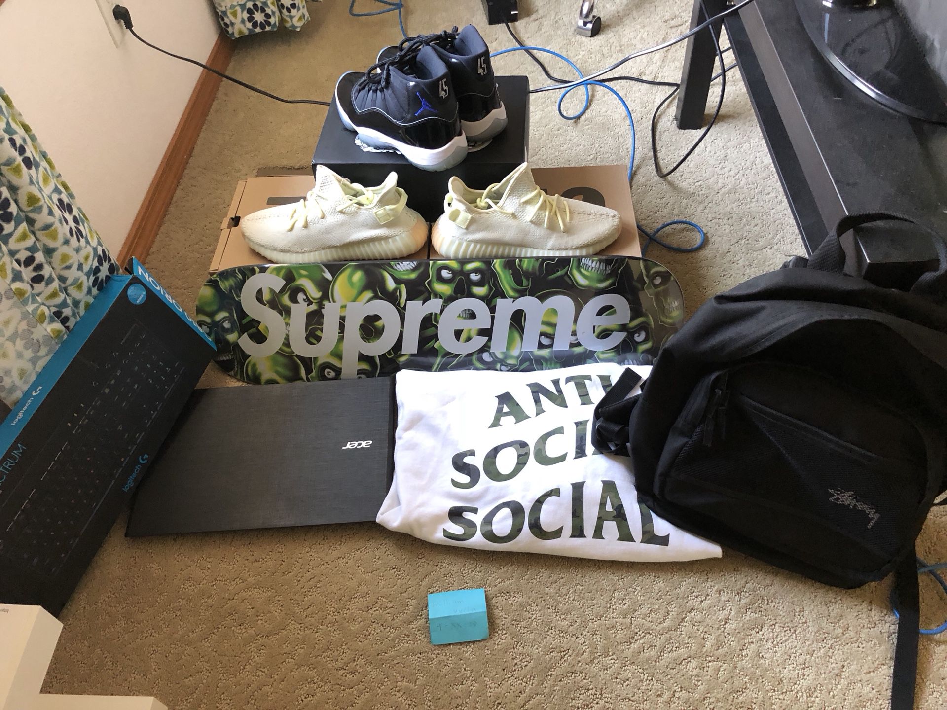 Shoes and computer bundle. (Logitech 810, Butter Yeezys, ASSC, Acer Laptop, Space Jams, Stussy Backpack, Supreme Skate Deck)