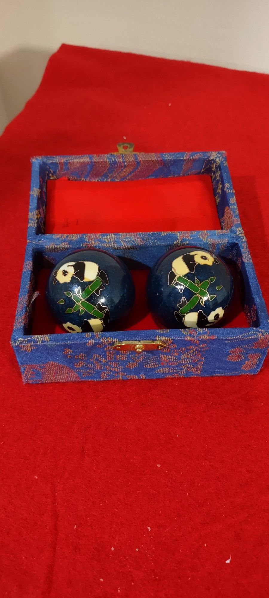 Traditional Baoding art from Chinese culture in its original velvet box. and panda bear figurines.