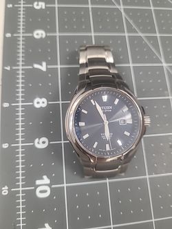 CITIZEN Eco-Drive TITANIUM SAPPHIRE WR 100 E11-(contact info removed) READ PLEASE