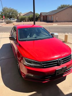 Red Volkswagen Jetta