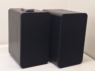 Insignia NS-HBTSS116 is a pair of 50-watt powered Bluetooth bookshelf speakers with remote