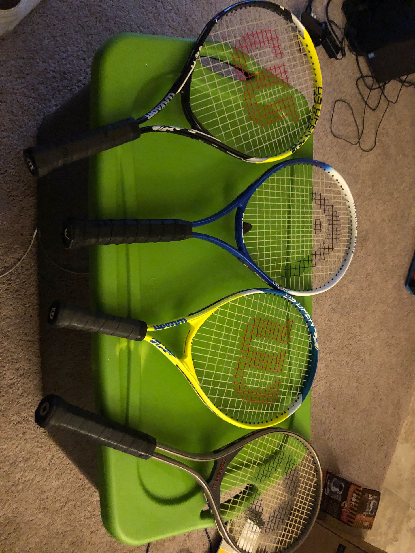 Brand new tennis rackets all of them for $200 (see page for individual price)