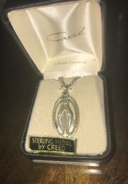 Miraculous sterling medal with 18” chain
