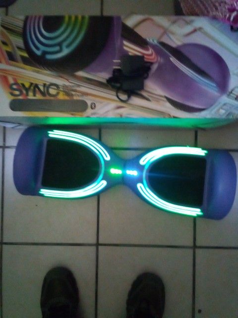 Hoverboard With Built In Bluetooth Speakers . Brand New With Charger And Box/ Instructions Manual.