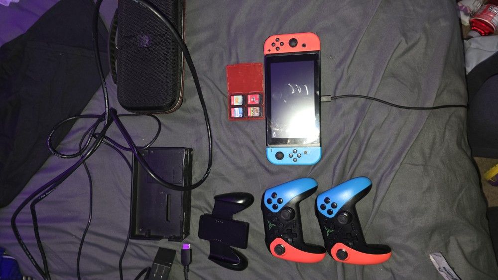 Nintendo Switch With 4 Games, 2 Controllers, 1 Joycon Controller, Dock, And Carry Case