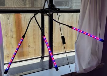 Three arm, adjustable, clip on plant light