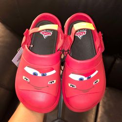 Disney Pixar Cars comfort clogs feature a Lightning McQueen