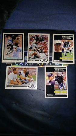 Marcus allen and howie long cards.
