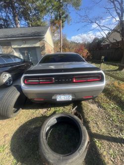  2 Car Rims That Came Off Of A Dodge Challanger
