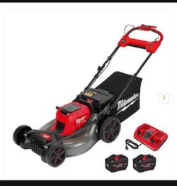 Milwaukee M18 Fuel lawn mower new with forge batteries and charger