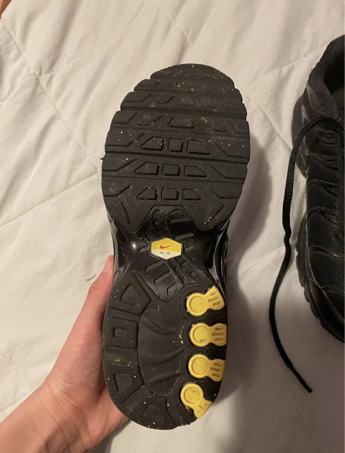 Black Nike TN trainers