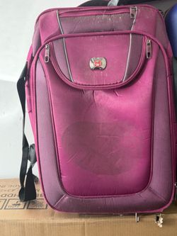 Purple / Magenta Softside Carry-On Rolling Suitcase