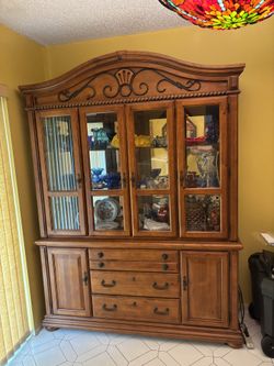 El Dorado furniture, China hutch two piece original owner and smoke-free home excellent condition.