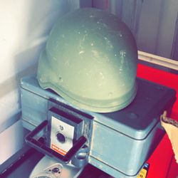 Army Helmet & Two Good Sheets Of Plywood