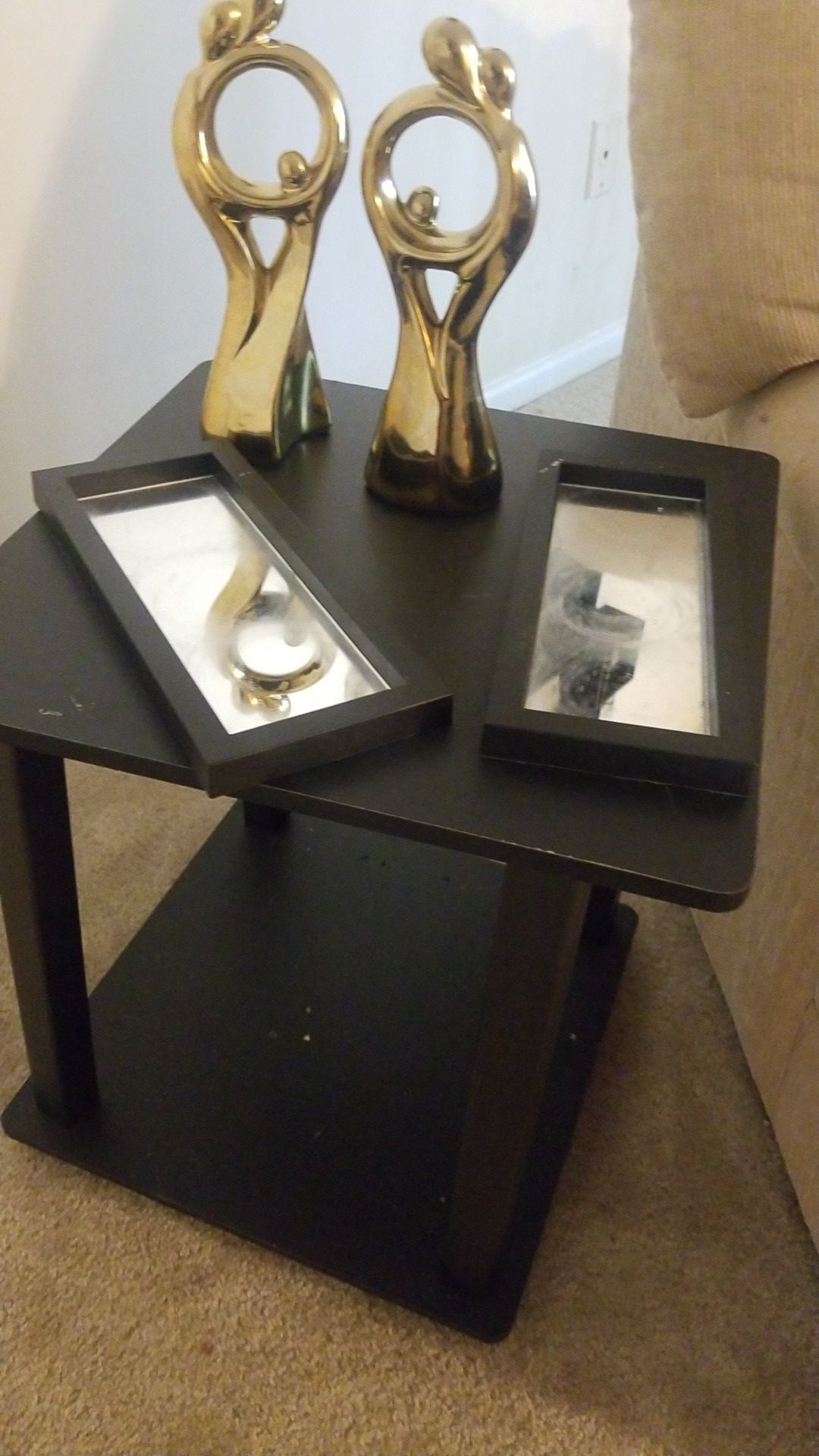 2 black end tables w/ gold statues and mirrors