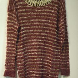 Red and  gold  sweater  with  gold neckline