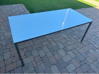 Glass/metal dining table