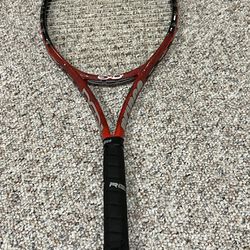 Four Used Tennis Rackets 