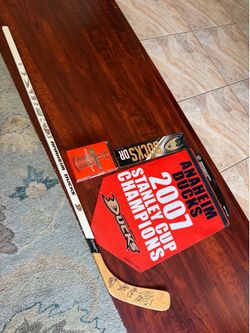 Anaheim ducks signed stick and STANLEY CUP DVD