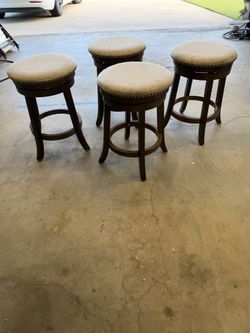 Four Swivel Chairs