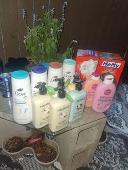 Dove body wash , hemp lotion and eos lotion 2 boxes of trash bags