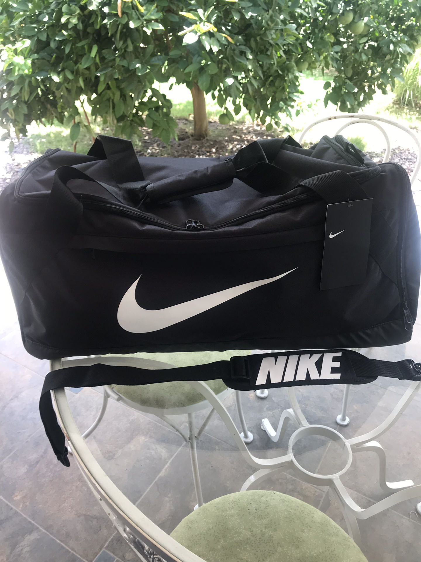 Brand new Nike duffle bag size medium