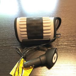 Munchkin Travel Bottle Warmer (warms formula and milk in the car) excellent used condition like new (pet free and smoke free household)