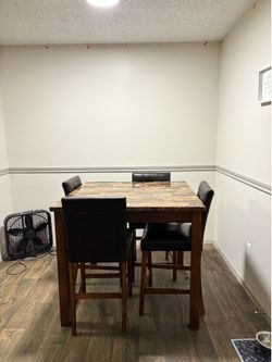 Dining room table with chairs
