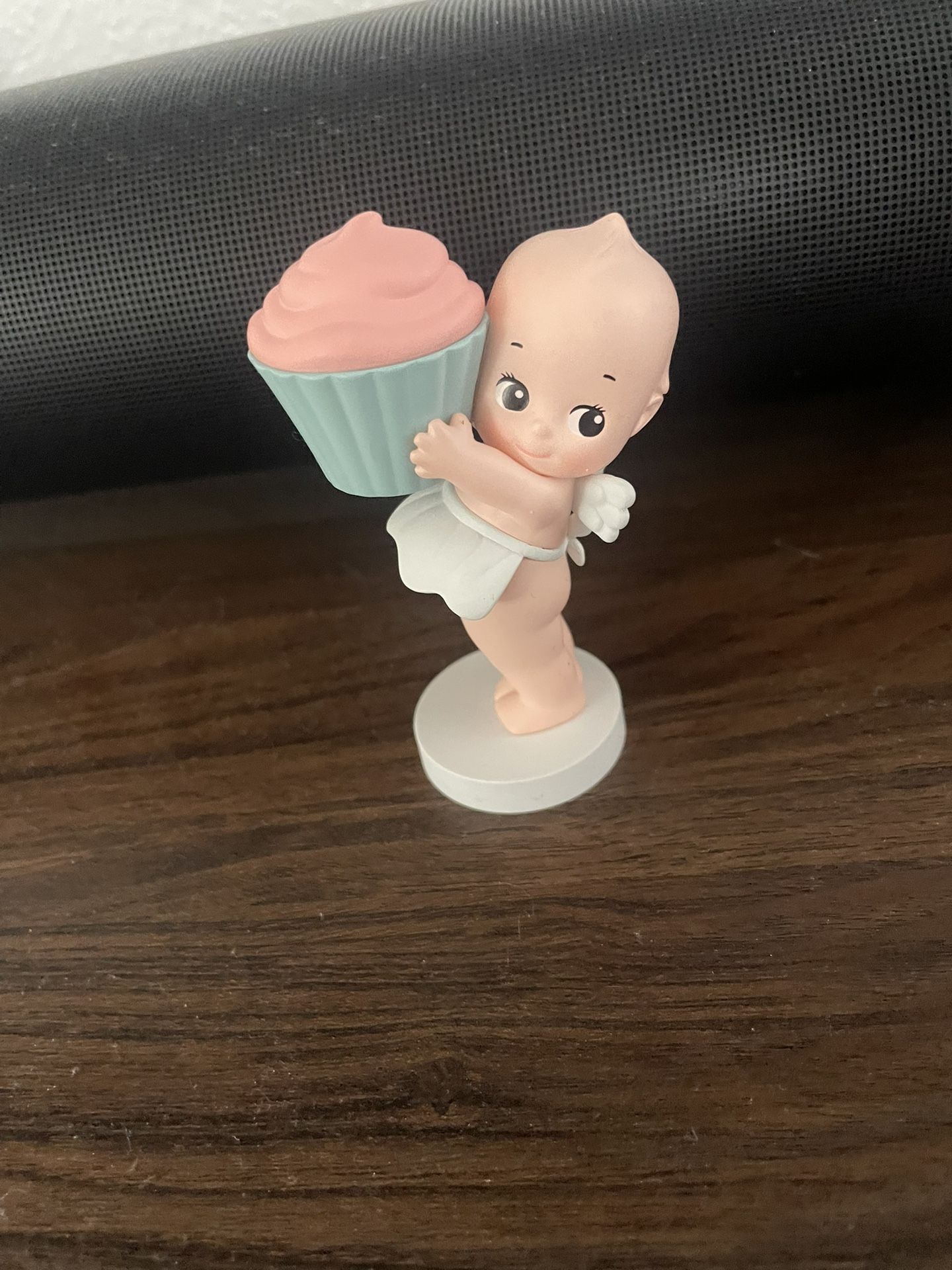 kewpie holding things for trade