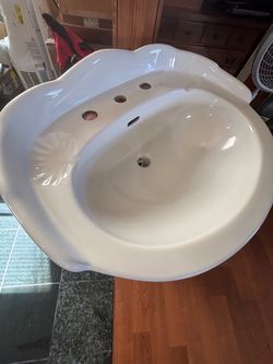 Pedestal sink with free new faucet