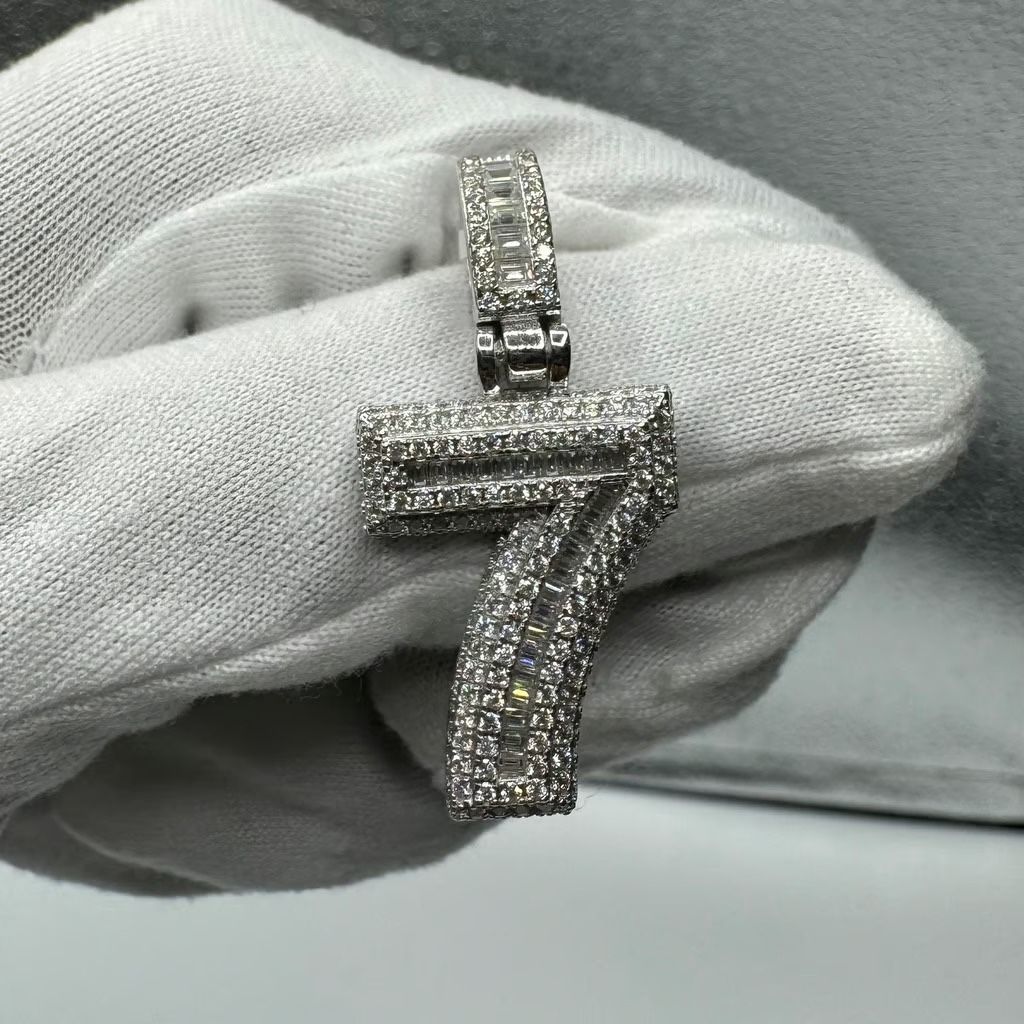 A Moissanite Number charm in Silver with moissanite of 1.81CTW