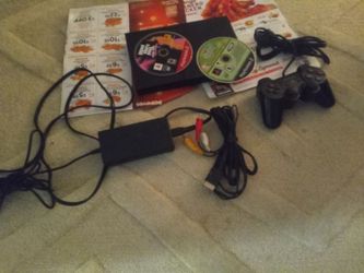 Sony PlayStation 2 slim two games$100 takes it firm today only