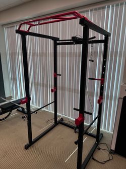 Heavy duty power rack with two pulley systems.