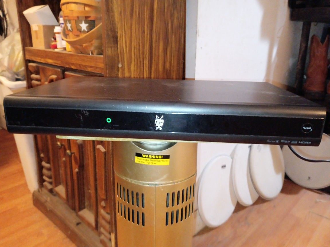 TIVO {T.V.}pre-record & playback streaming device converter type box