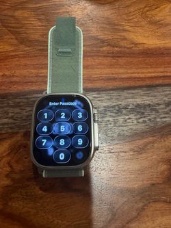 Ultra (Apple) Watch 3 , 49 MM, Titanium Natural Finish Case, Original Green/Neon Trail Loop Band  $550